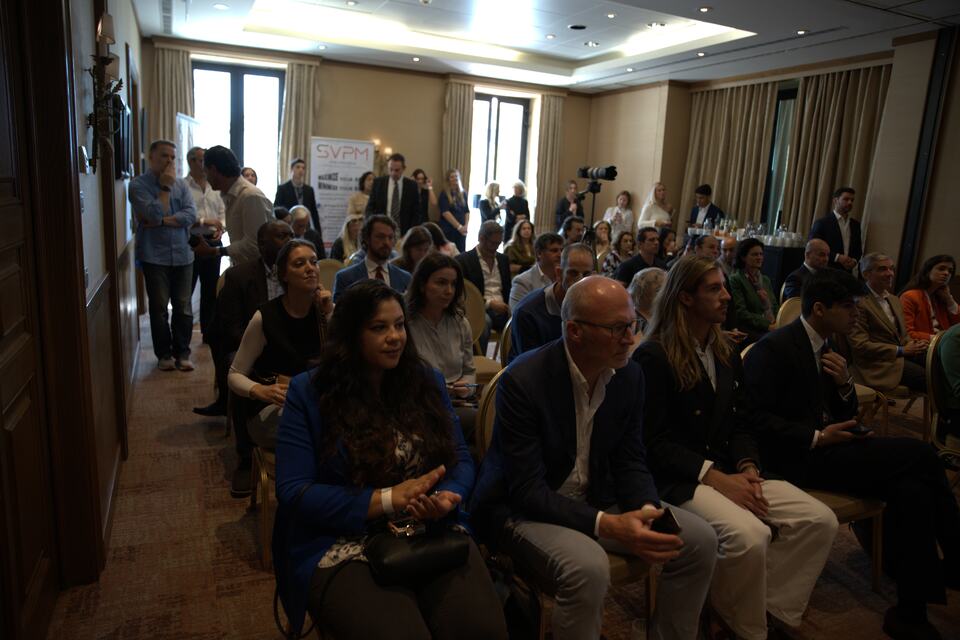 The PREIS audience gathered before a conference session